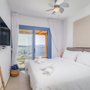 blue-lefkada-luxury-apartments-bedroom-blue-window-fan-copy.jpg