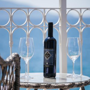 blue-lefkada-luxury-apartments-wine-sea-glasses.jpg