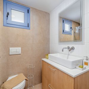 lefkada-blue-luxury-apartments-bathroom-blue-window-copy.jpg
