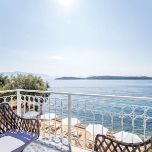 lefkada-blue-luxury-apartments-chairs-sea-white-railing-copy.jpg