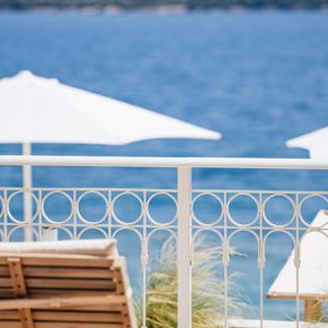 lefkada-blue-luxury-apartments-lounge-chair-sea.jpg