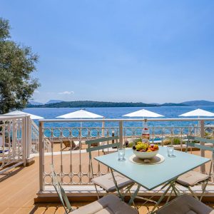lefkada-blue-luxury-apartments-table-fruit-outdoor.jpg